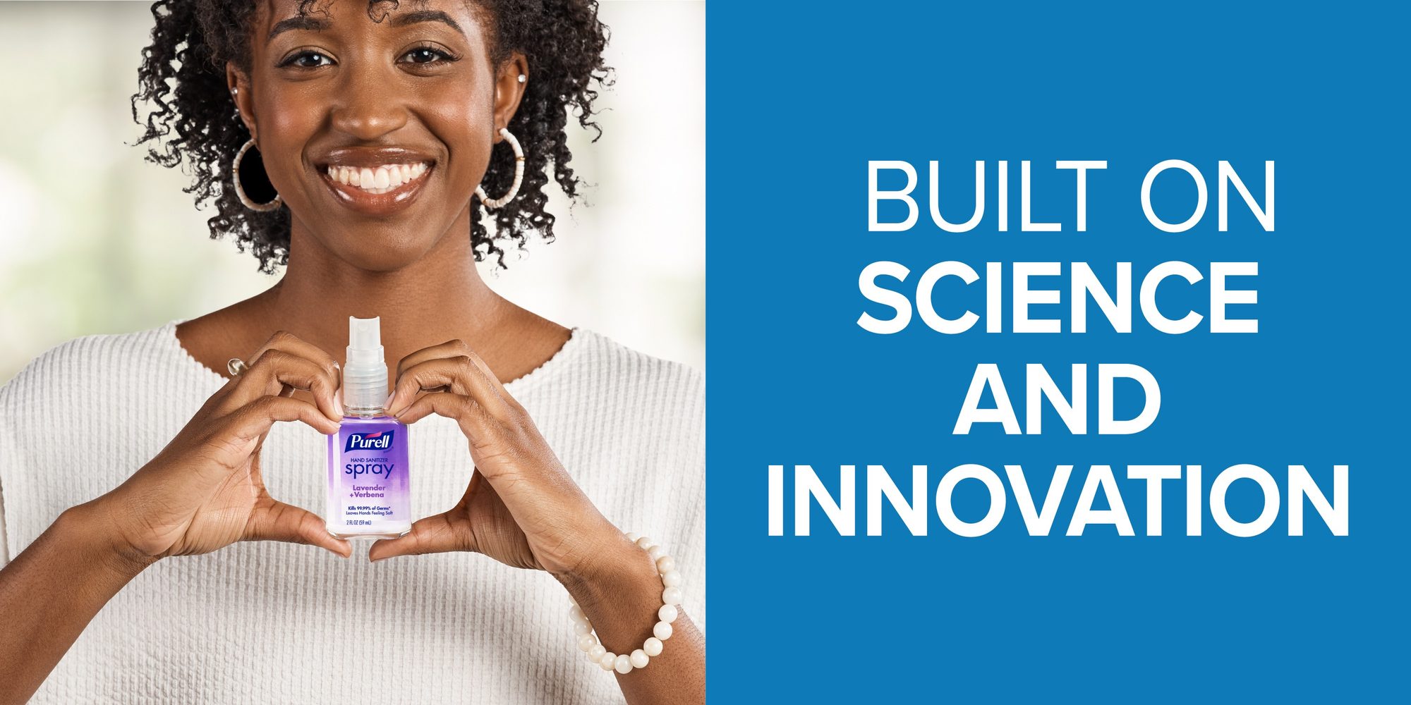 PURELL hand sanitizer spray held in heart-shaped hands